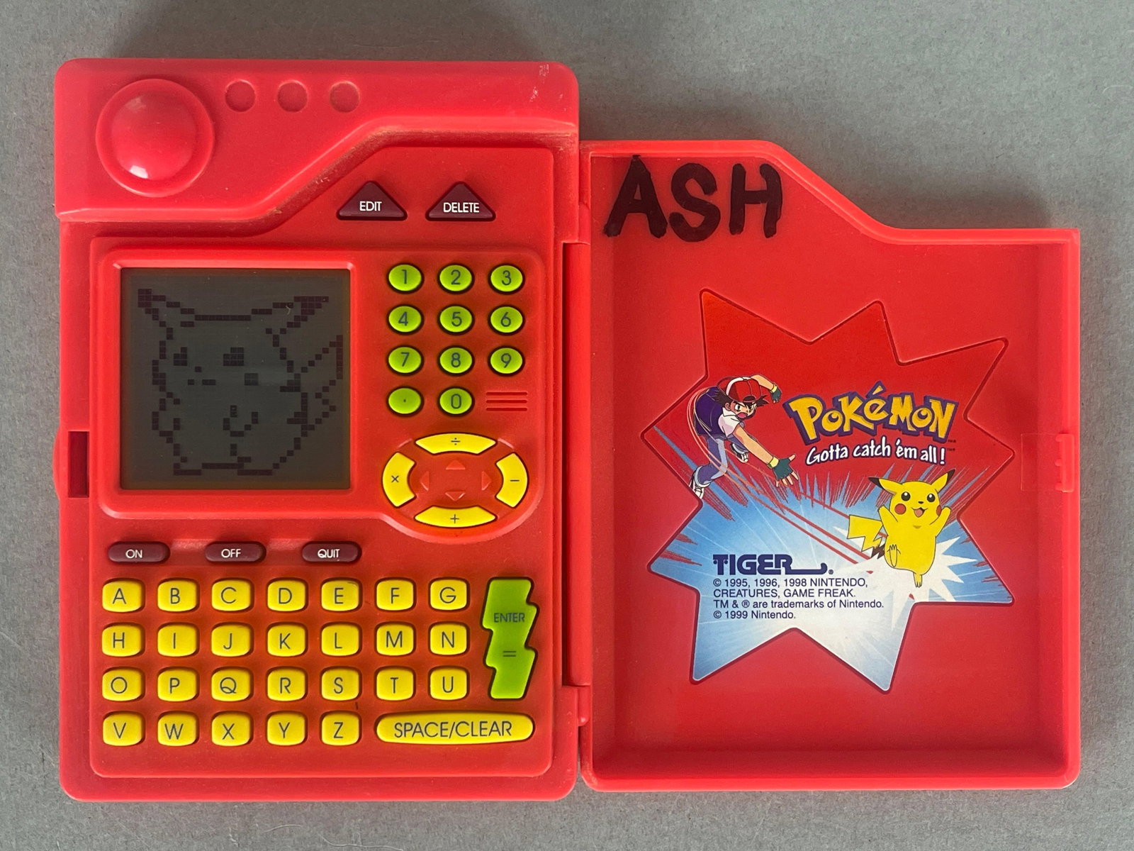Original 1998 Pokemon Pokedex Tiger Electronics: Tested, Working Condition with sound, marked inside, Measures 3 1/2 x 4 3/4 Inches