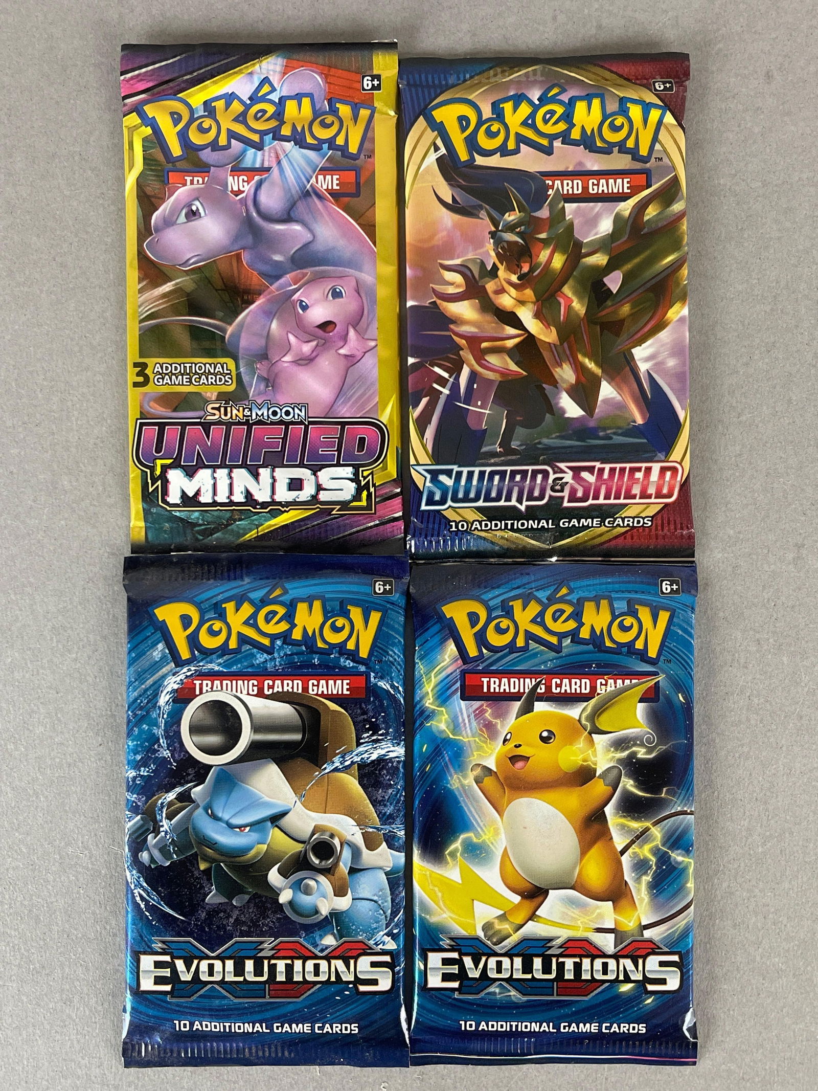 4 - 2016 - 20 Pokemon Evolutions, Sword and Shield, and Unified Minds Unopened Booster Packs: 2 - 2016 Evolutions Booster Packs, 2019 Sun and Moon Unified Minds Booster Pack, 2020 Sword and Shield Booster Packs