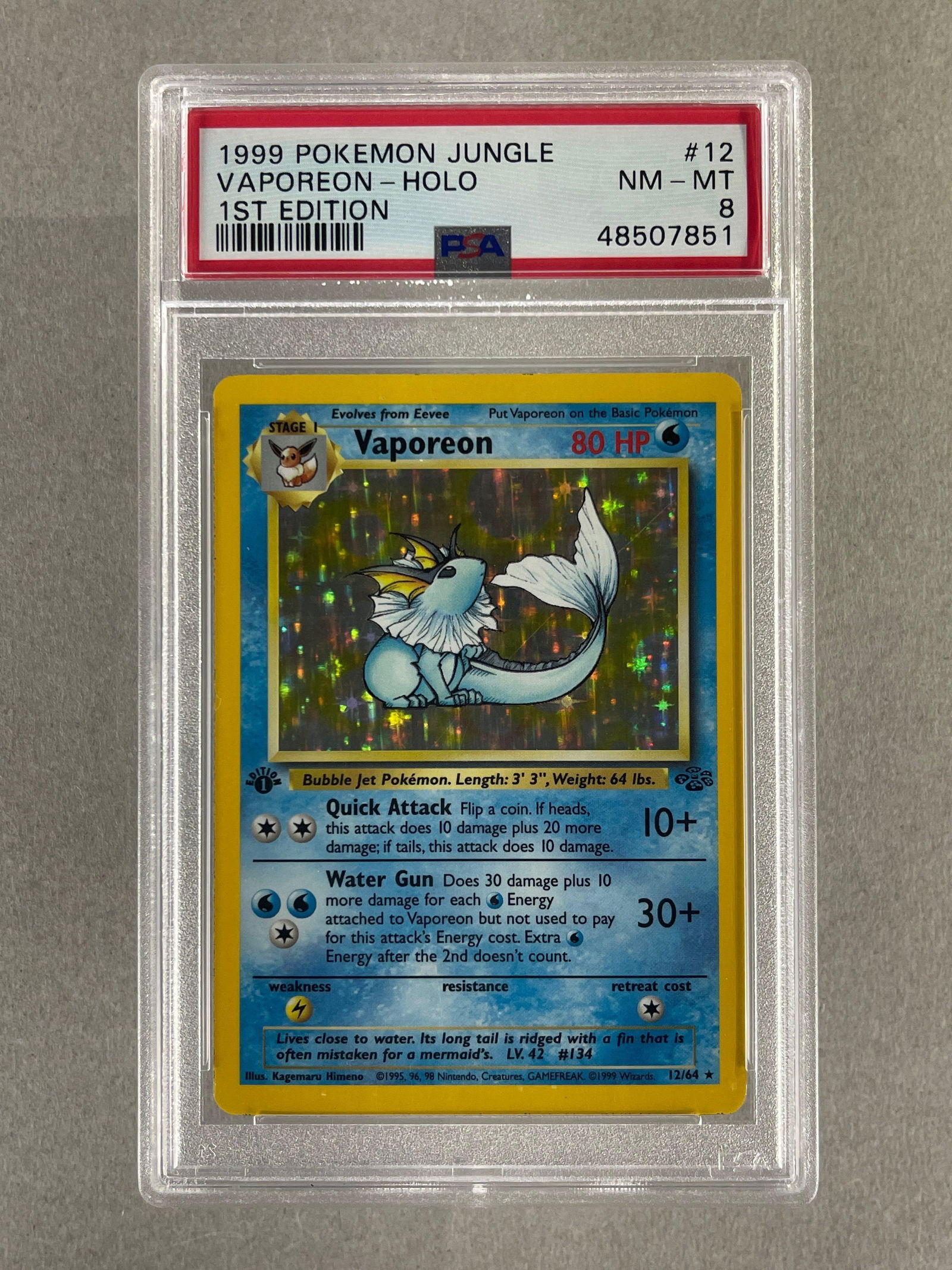 1999 Pokemon Jungle 1st Edition Holo Vaporeon #12 PSA 8 (1 of 2)