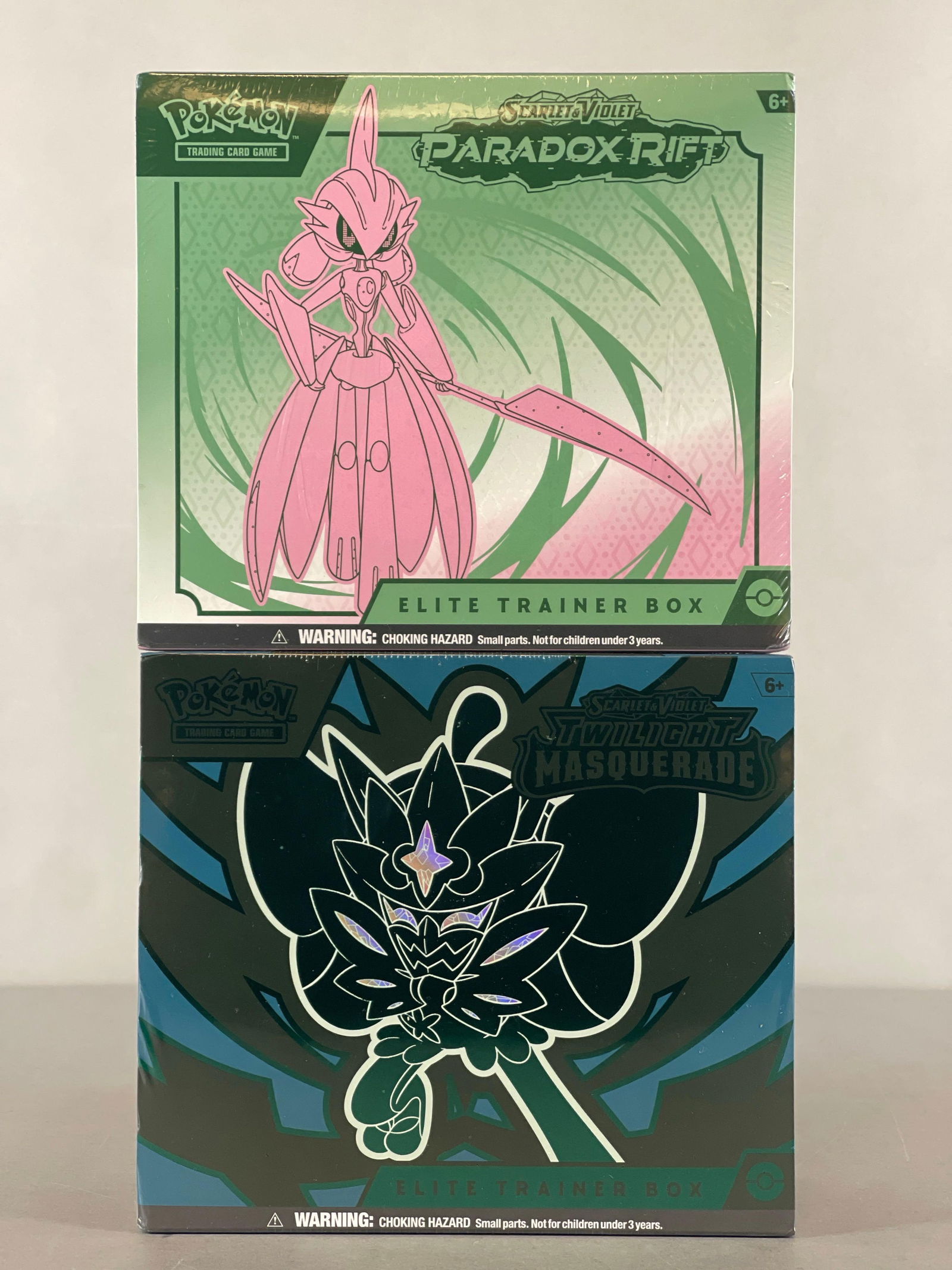 2 - 2023 - 24 Pokemon Scarlet and Violet Twilight Masquerade and Paradox Rift Elite Trainer Boxes: 9 - Booster packs per box