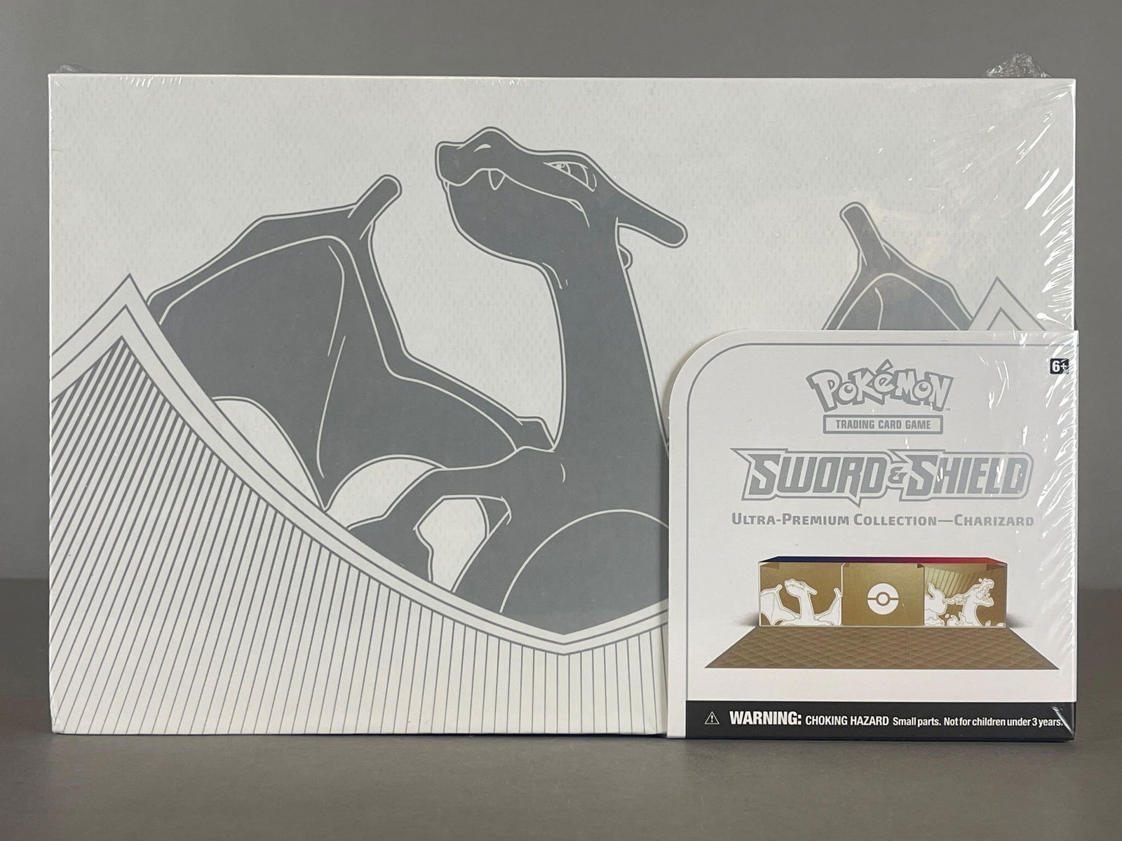 2022 Pokemon Sword and Shield Ultra Premium Collection Charizard Box: Includes 3 - Foil Promo, Playmat, 1 Metal Coin, 16 - Booster Packs From SWSH, and More