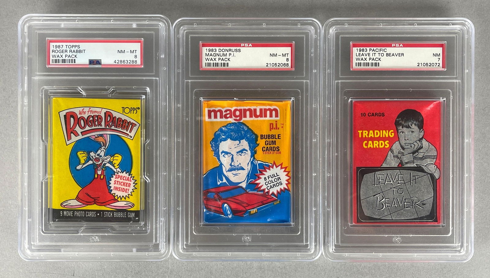 3 - 1983 - 87 PSA Graded Wax Packs with 7 and 8s: 1983 Pacific Leave it to Beaver PSA 7, 1983 Donruss Magnum P.I. PSA 8, and 1987 Topps Who Framed Roger Rabbit PSA 8 - Only 1 Graded higher