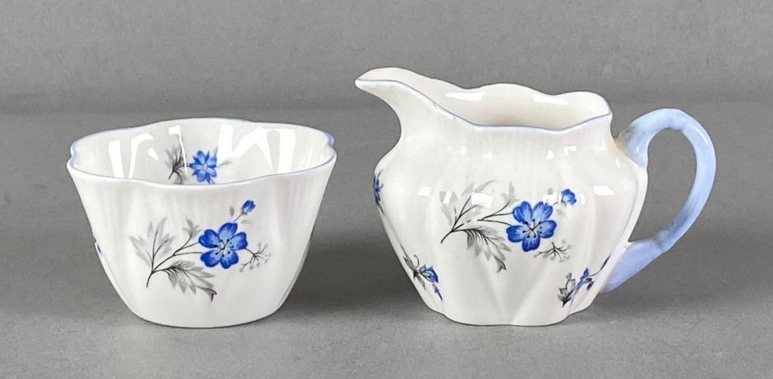 Set of 2 Shelby England Porcelain Sugar and Creamer: Both marked on base, largest measures 2 1/4” H x 3 1/4” W x 2 1/2” D