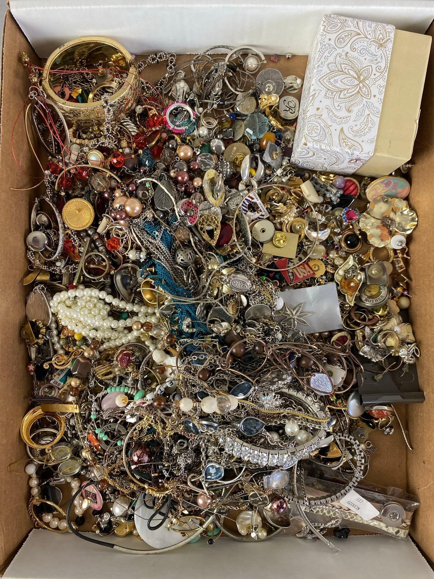 Group of Costume Jewelry: includes pins, rings, earrings and more