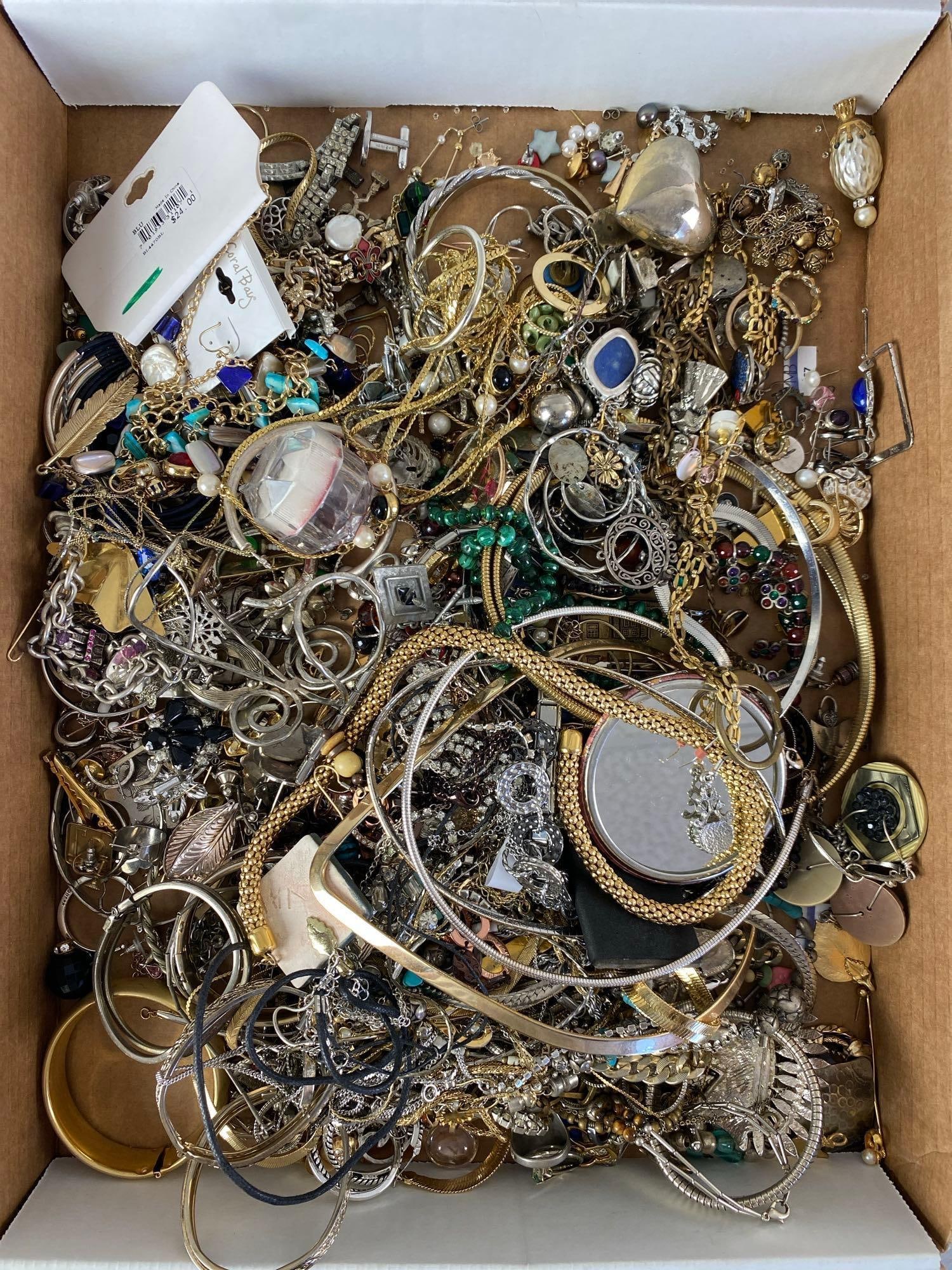 Group of Costume Jewelry: some sterling silver and gold plated, Includes earrings, necklaces, rings and more