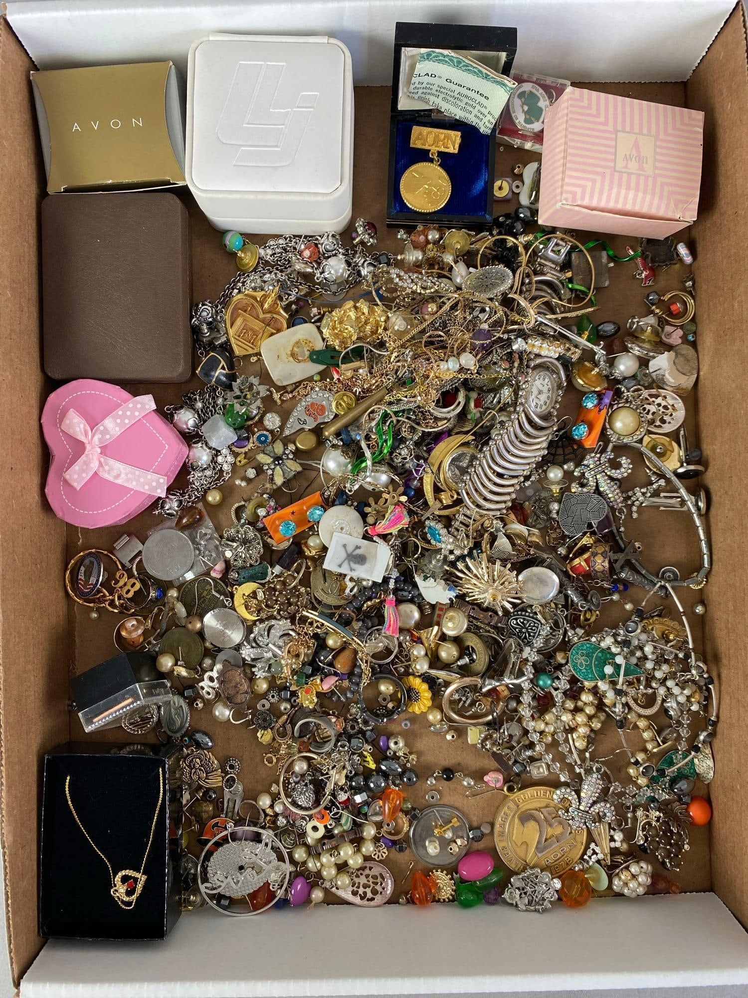 Group of Costume Jewelry: Some with original boxes, Inclufes pins, rings, coins, earrings and more