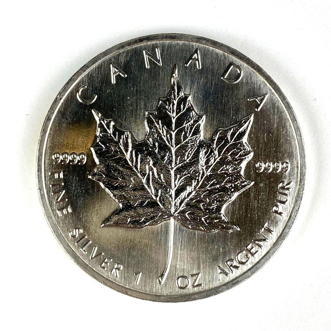 1990 Canada $5 Maple Leaf 1 oz 9999 Fine Silver Coin (1 of 2)