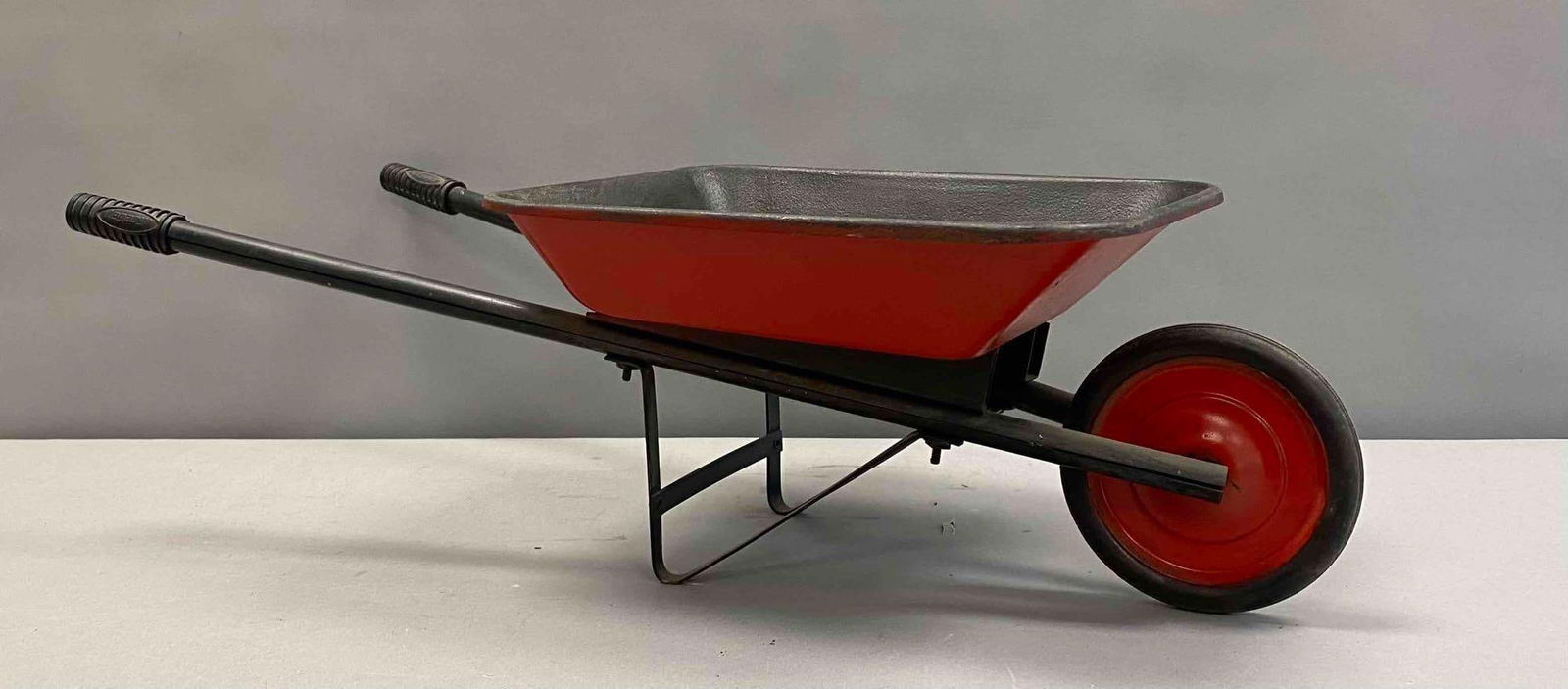 Legacy Children Play Wheelbarrow: Measures H 8 x W 11 x L 28 inches.