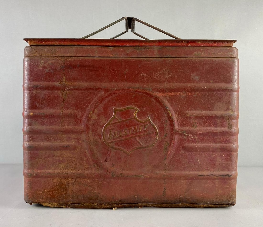 Vintage Falstaff Beer Metal Cooler: Circa 1940’s. Has rust throughout. Measures H 16 x W 9 x L 17 inches.