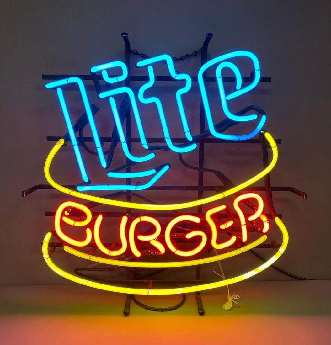 Miller Lite Burger Neon Advertising Sign: No in house shipping. Third party shipping recommended. Working condition. Measures H 21 x W 4 x L 21 inches.