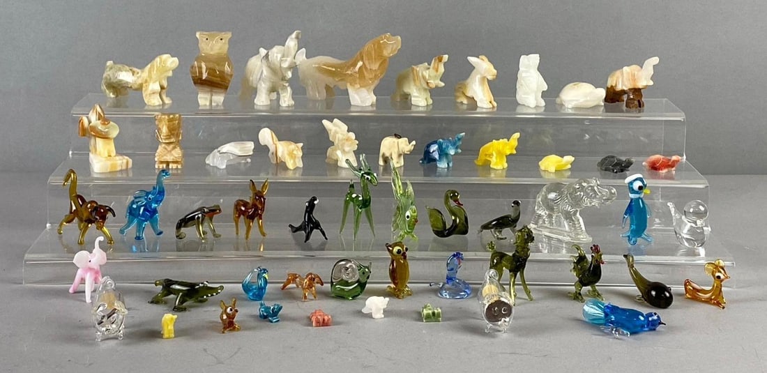 Group of Assorted Stone Carved Figures and More: Includes Glass Figures such as Owls, whales, and more. Largest figure measures 4” in length. Stand not included.
