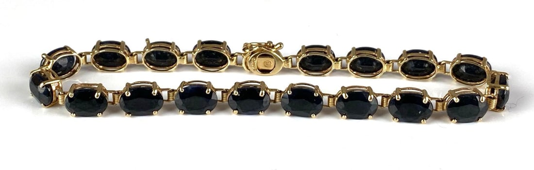 14K Yellow Gold Onyx Bracelet: total weight of 8 grams, measures 7” in length