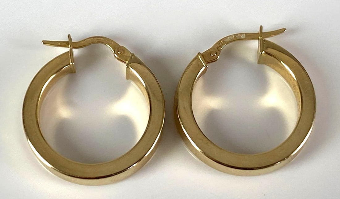Pair of 14K Yellow Gold Hoop Earrings: Total weight of 2.4 grams, each measures 3/4” H