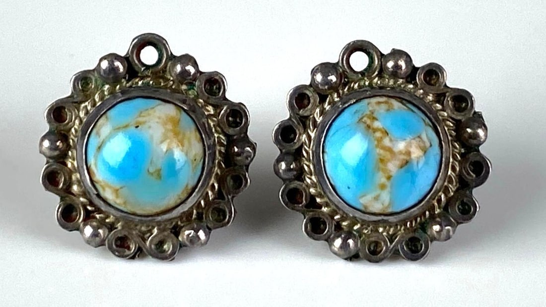 Pair of Mexican Sterling Silver Turquoise Earrings: Each measures 1/2” H x 1/2” D