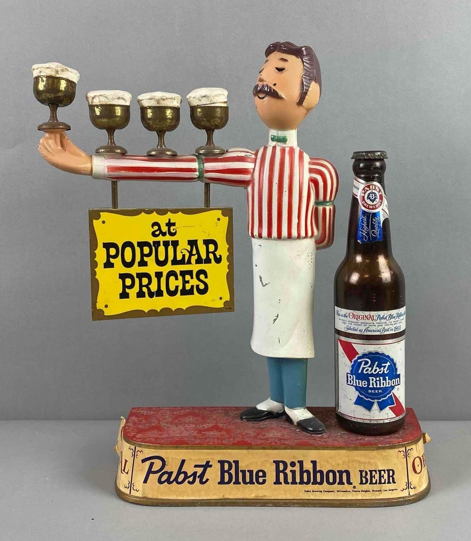 Pabst Blue Ribbon Beer Bartender Advertising Display: Mfg in Chicago, Illinois. Features bottle and bartender. Measures H 14 1/2 x W 3 1/2 x L 10 1/2 inches.