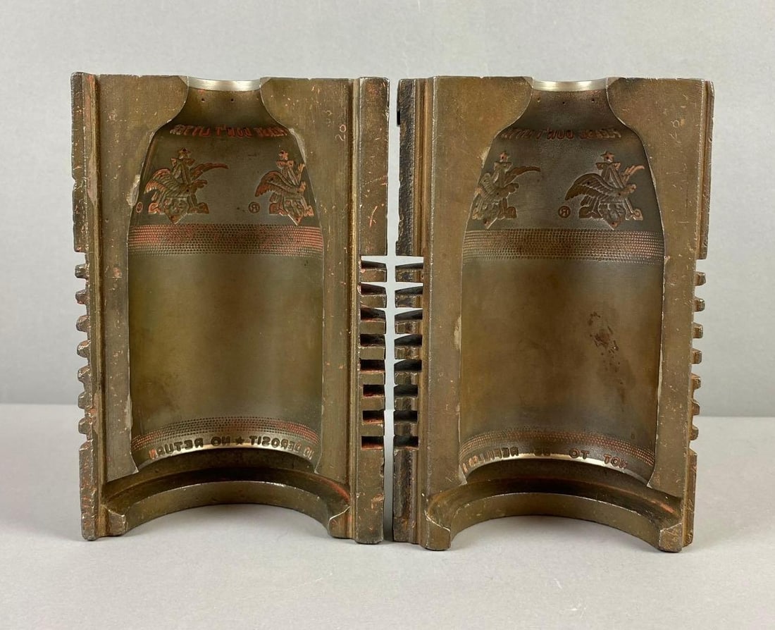Vintage Anheuser Busch Cast Iron Beer Bottle Mold: Does not have bottom part. Together measures L 6 1/2 x W 5 1/2 inches.