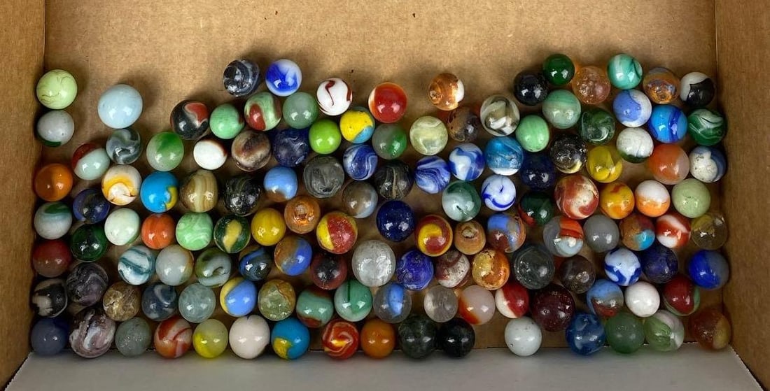 Group of Assorted Vintage Marbles: Some are chipped. A few are UV light reactive. Largest measures .75 inches.