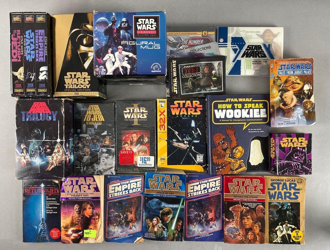 Group of Star Wars Books and VHS Tapes: Includes Sega arcade, postcards, Figural mug