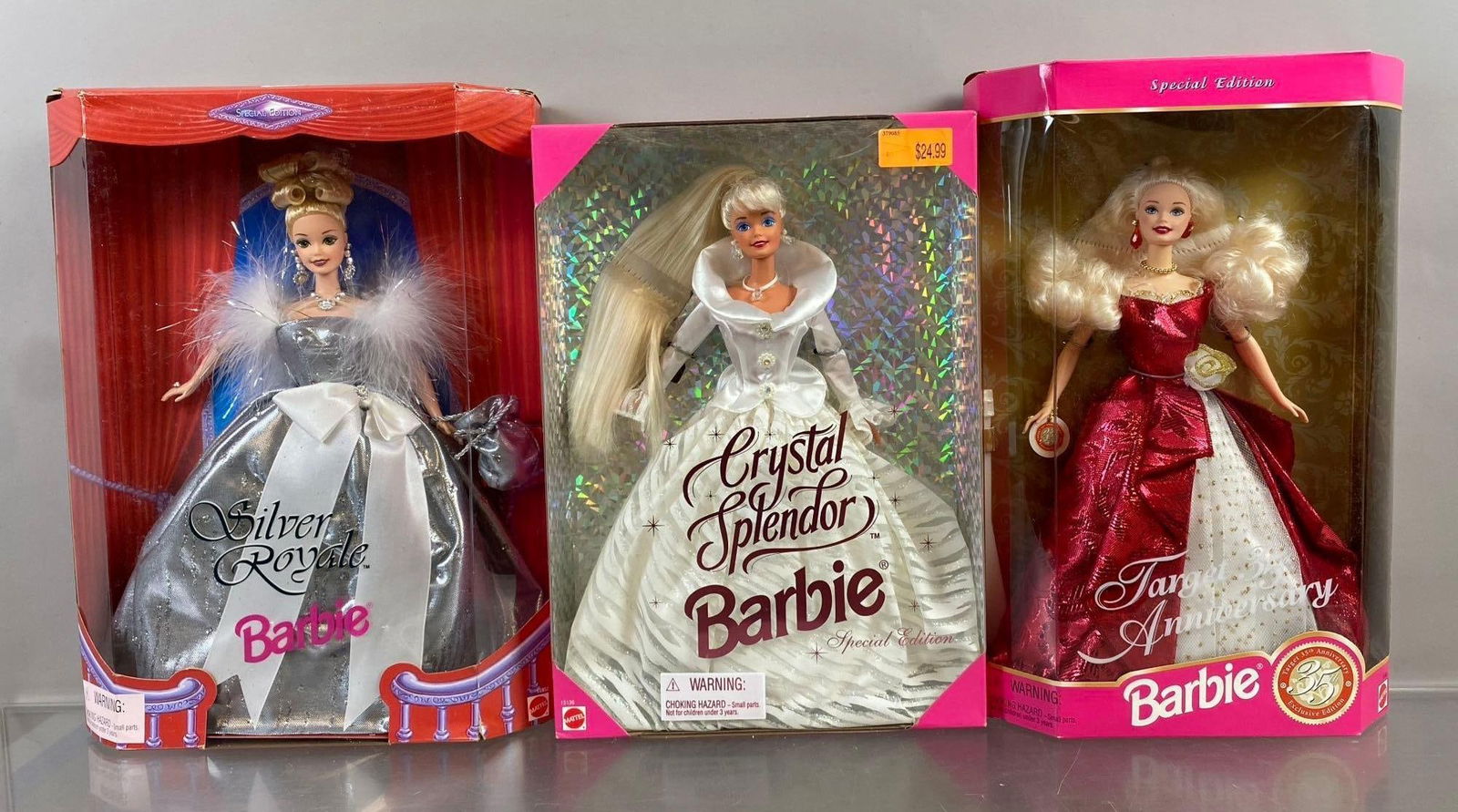 Group of 3 Mattel Barbie Fashion Dolls: Silver Royal, Crystal Splendor, and more. Mild wear New in packaging. circa 90’s