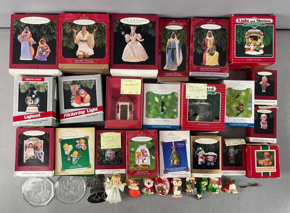 Group of Hallmark Keepsake Christmas Ornaments: Includes holiday pins, wizard of oz, light and motion