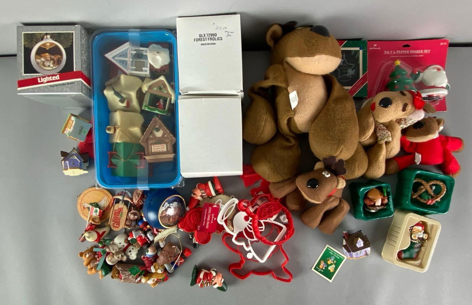 Group of Assorted Christmas Items: Includes cookie cutters, ornaments, plushies and more, largest measures 12” H x 8” W