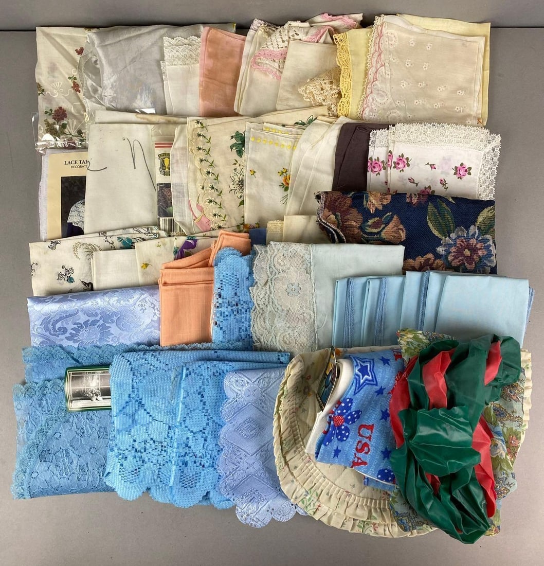 Group of Hankerchiefs and More: Includes poncho, doiley, runner and more. Largest item measures H 15 x W 34 inches.