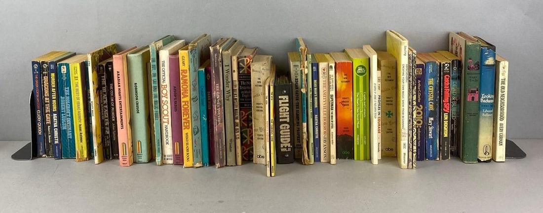 Large Group of Books: Include The Official Boy Scout Handbook, The Amityville Horror, Ramona Forever and more. Largest measures H 8 3/4 x W 6 3/4 x D 1/4 inches.