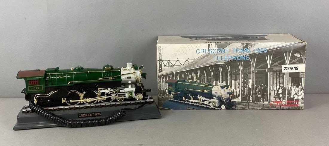 Telemania Crescent Train 1925 Telephone: Untested. Box measures H 6 1/2 x W 13 3/4 x D 4 3/4 inches.