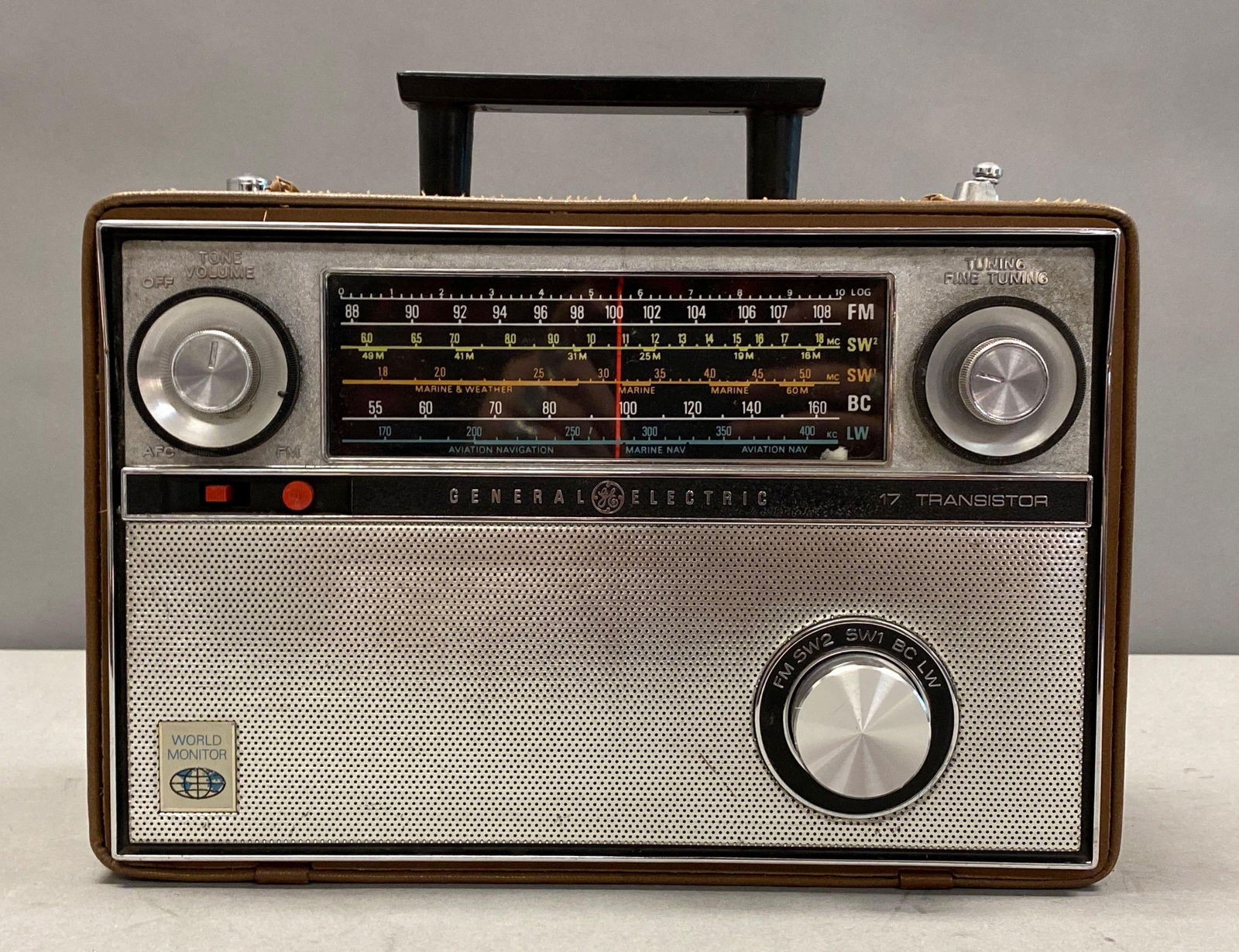 General Electric World Monitor AM/FM Portable Radio: Untested, missing power cord, measures 10” H x 12 1/2” W x 5” D