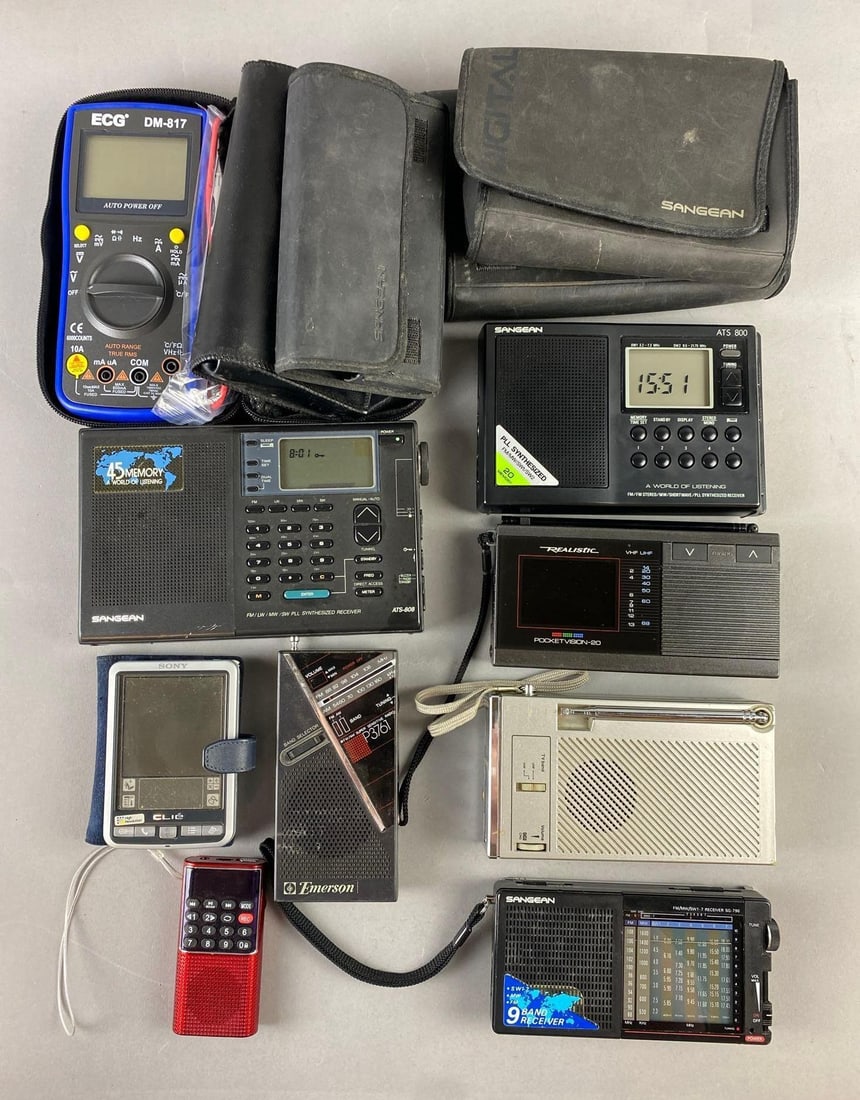 Group of Assorted Sangean Receiver Radios and More: Includes Emerson, Pocketvision, and more. Largest measures L 8 x W 5 inches. Most power on.