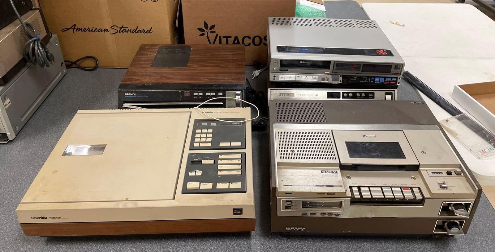 Group of Vintage Laser Discs Players: Includes Sony Betamax , RCA, zenith, all untested, largest measures 5 1/4" x 21 3/4" x 16"