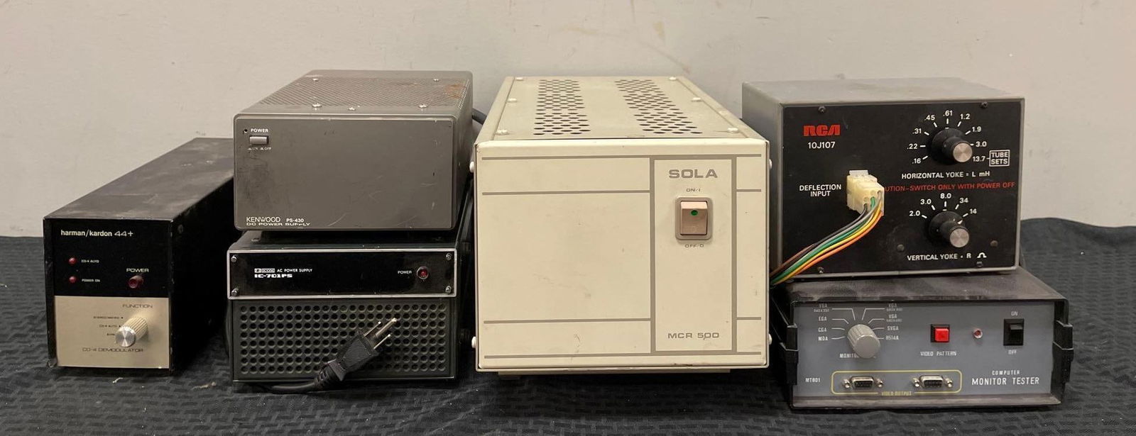 Group of Power Supplies and More: 3rd party shipper recommended. All untested, includes harman kardon , kenwood, RCA, largest measures 8 1/2" x 8 1/2" x 17"