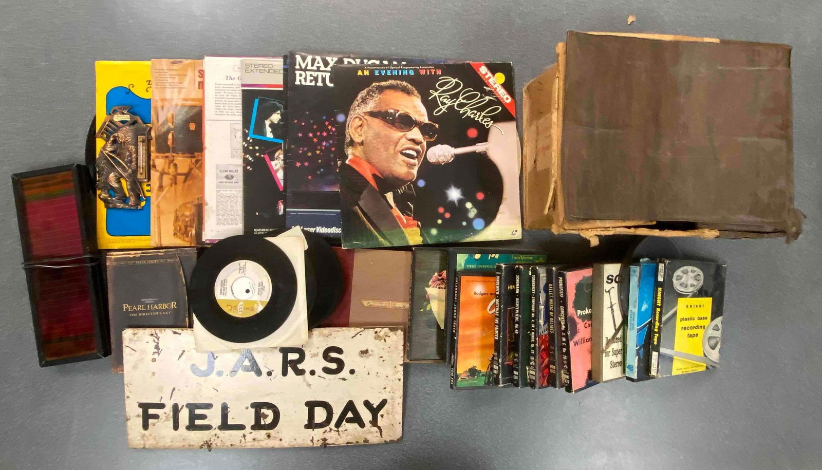 Group of Assorted Vinyl Records and More: Features 45s, includes Ray Charles, signs, DVDs and more