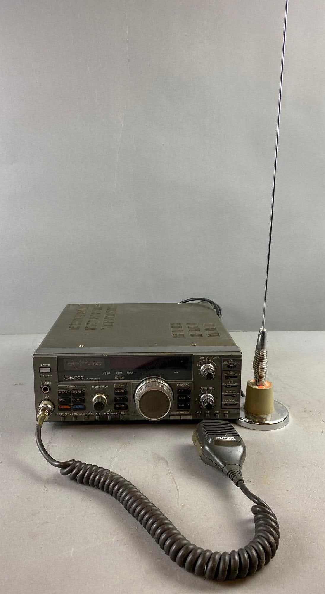 Kenwood HF Transceiver: Includes antenna and Microphone. Untested. No power cord. Measures H 4 x W 11 x L 11 inches.