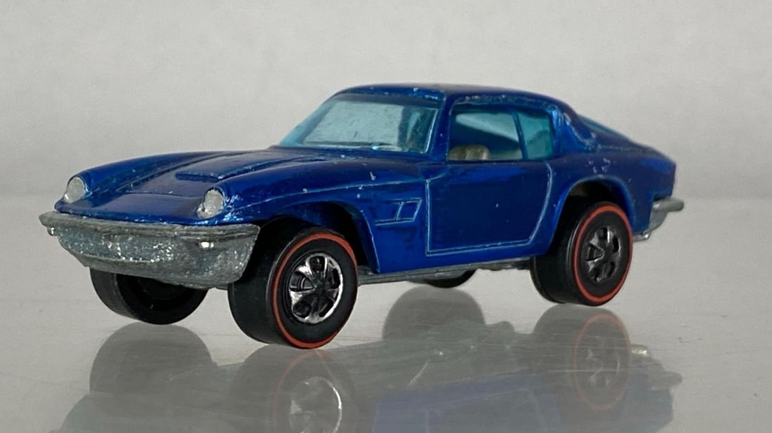 1969 Mattel Hot Wheels Maserati Mistral: Die-cast, redline tires, made in Hong Kong, blue windows, paint wear on hood and rear