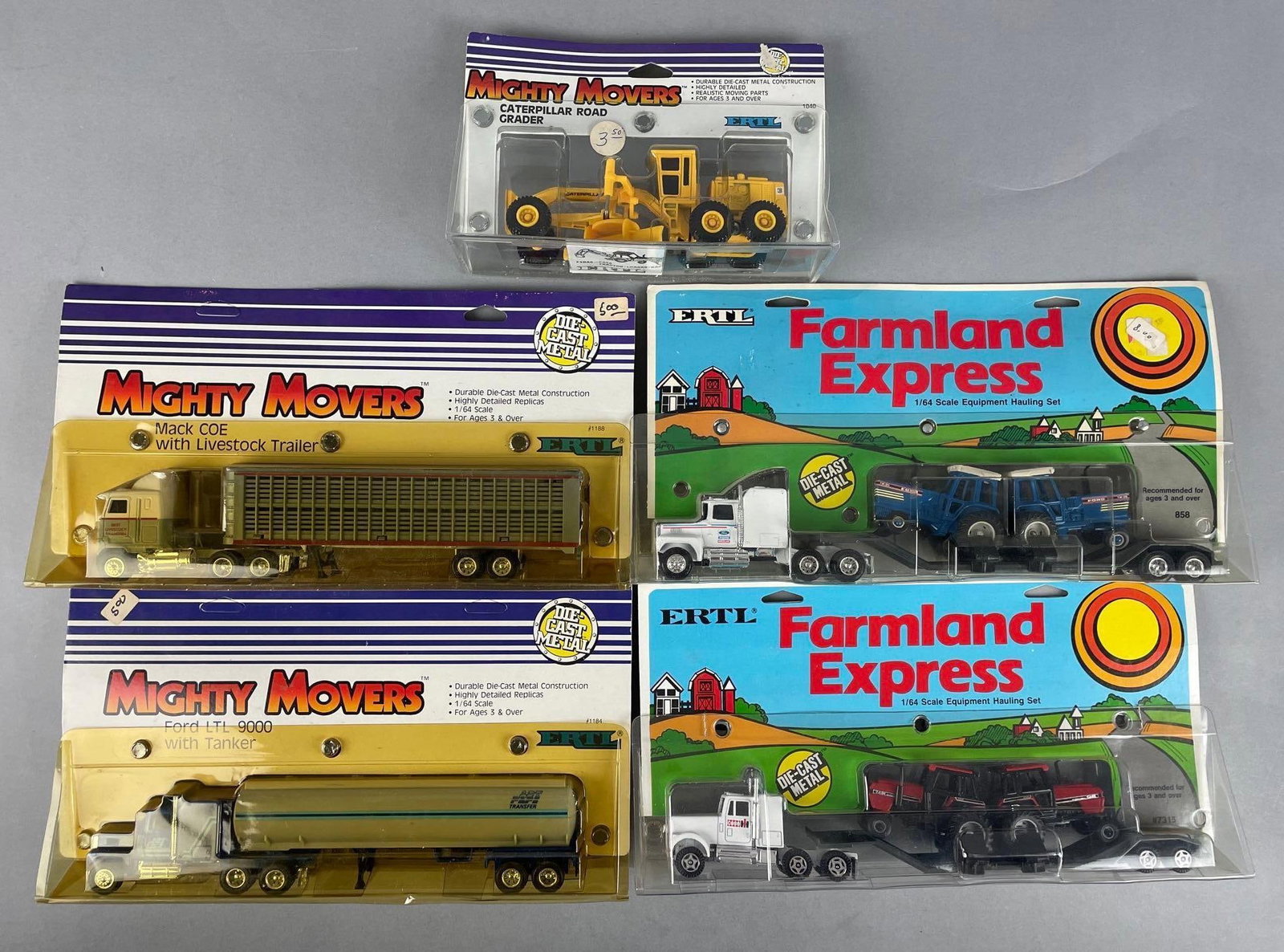 Group of Ertl Die-Cast Vehicles: 1:64 scale farmland express, mighty movers