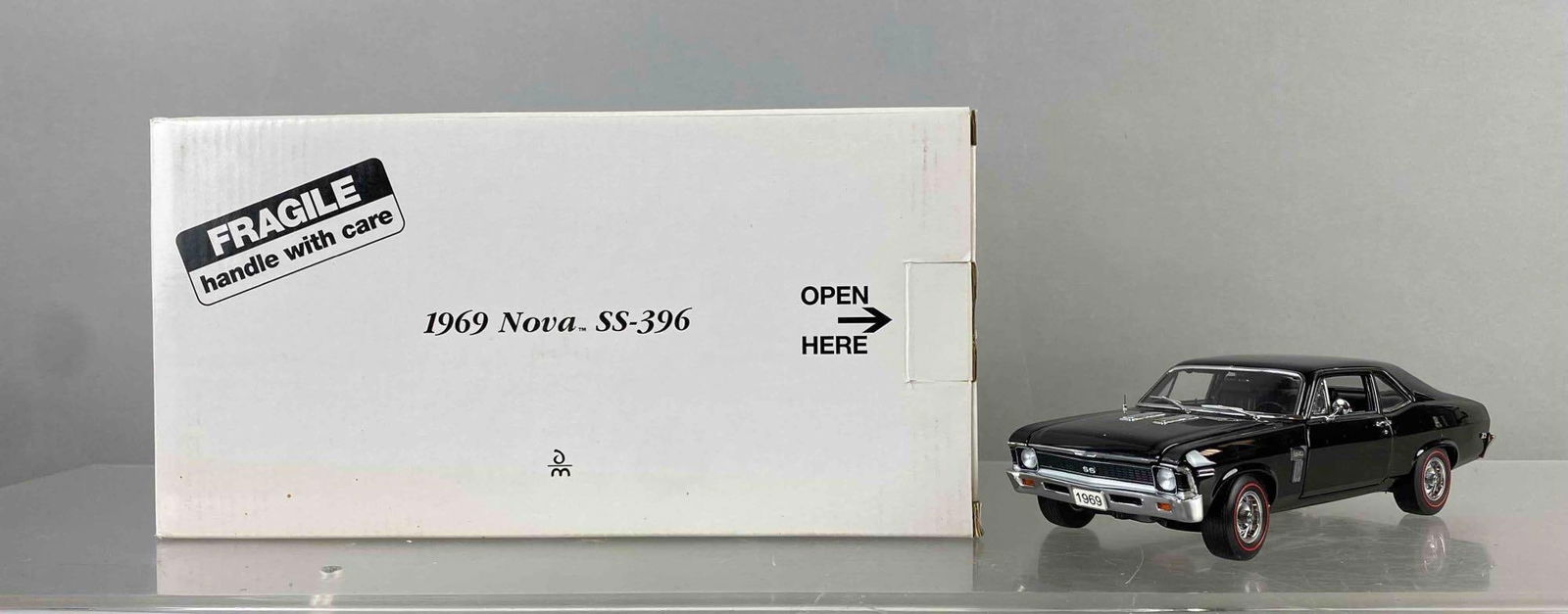 The Danbury Mint Collector 1969 Chevrolet Nova SS Die Cast Vehicle: 1969 Chevrolet Nova SS. Like new in original packaging. Circa 1990?s. Car measures H 2 x W 3 x L 8 inches.