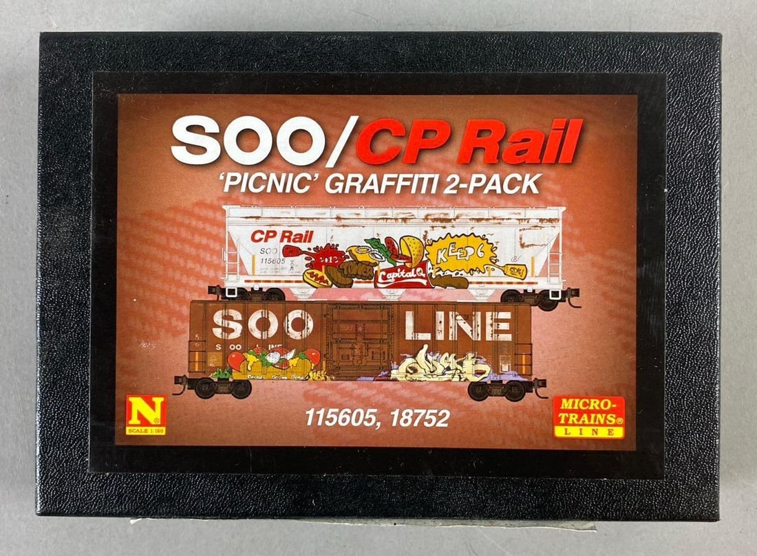 Micro Trains N Scale S00 / CP Rail Train Cars Picnic Graffiti Two Pack: Like new in original packaging. Box measures H 1 x W 4 1/2 x L 6 inches.