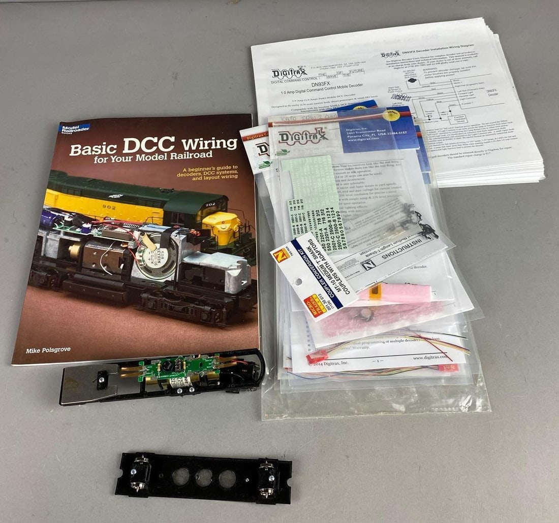 Basic DCC Wiring Beginner Guidebook and More: Includes wiring, parts, and more. Book measures L 11 x W 8 inches. Untested.