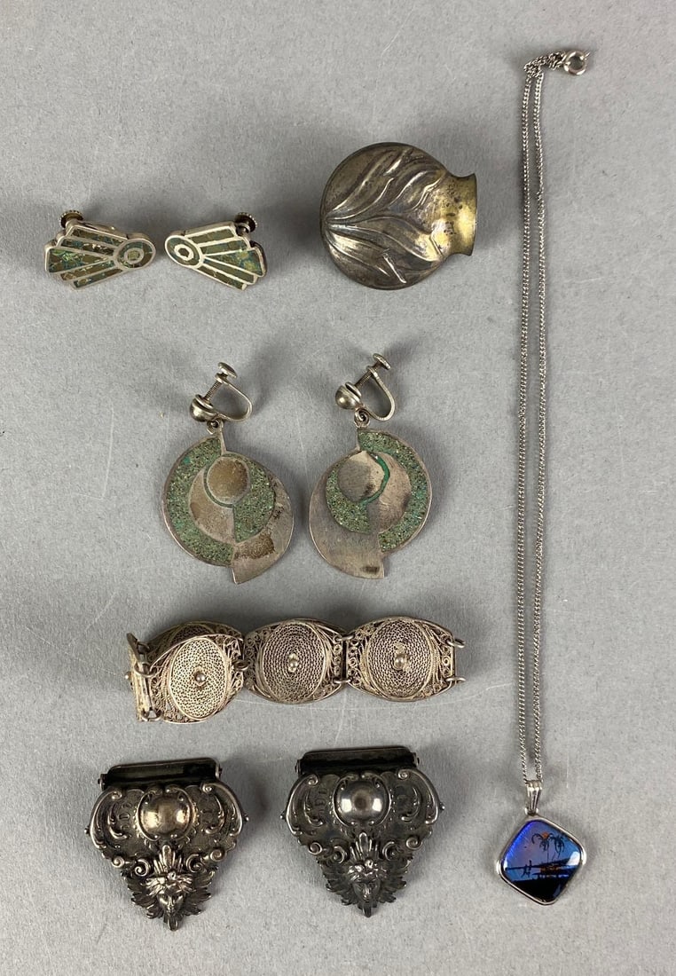 Group of Sterling Silver Jewelry: Includes earrings, necklace, bracelet and more, largest measures 16” in length