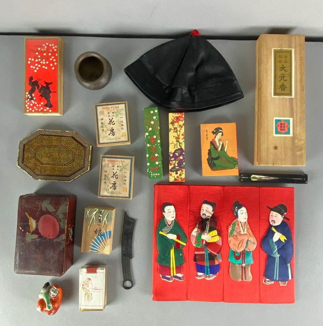 Group of Assorted Asian Items: Includes matches, cigarettes, boxes and more, largest measures 9 1/2” H x 12” W