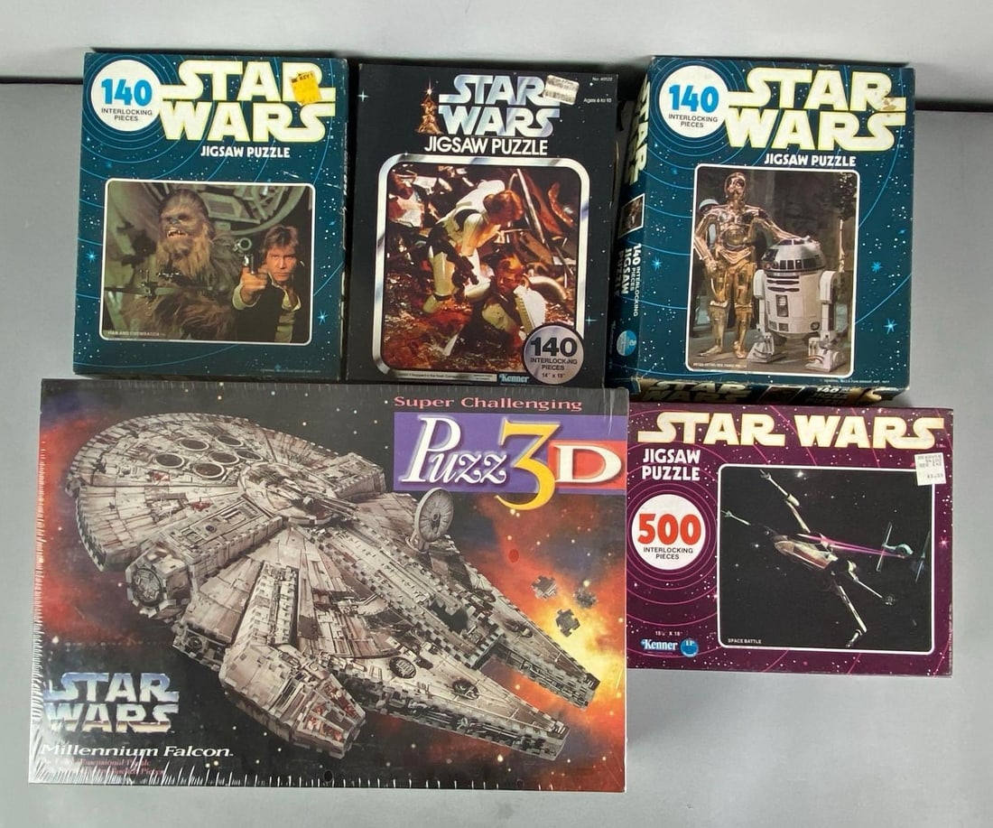 Group of 5 Star Sears Jigsaw Puzzles: Unknown set completions, Includes Sealed 3D Millennium Falcon Puzzle, largest box measures 12” H x 18” W x 3 1/2” D