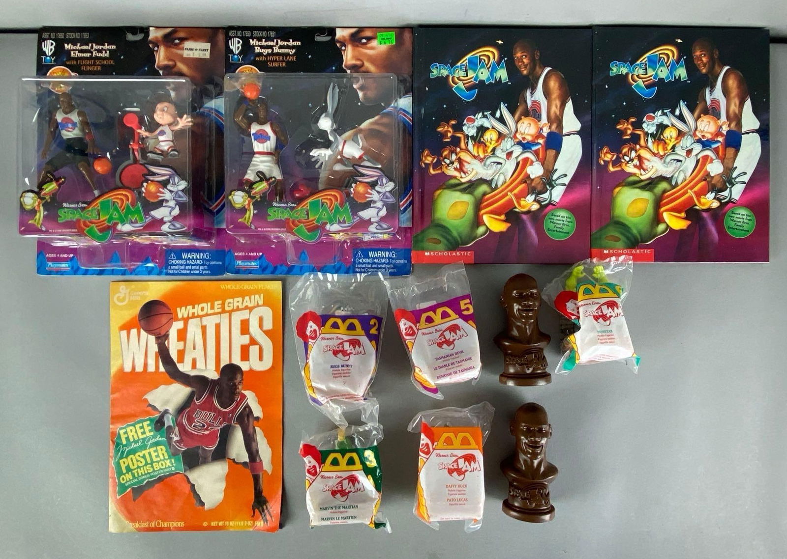 Group of Michael Jordan Space Jam Items: Includes McDonalds Toy Premiums, gumball busts, books and more