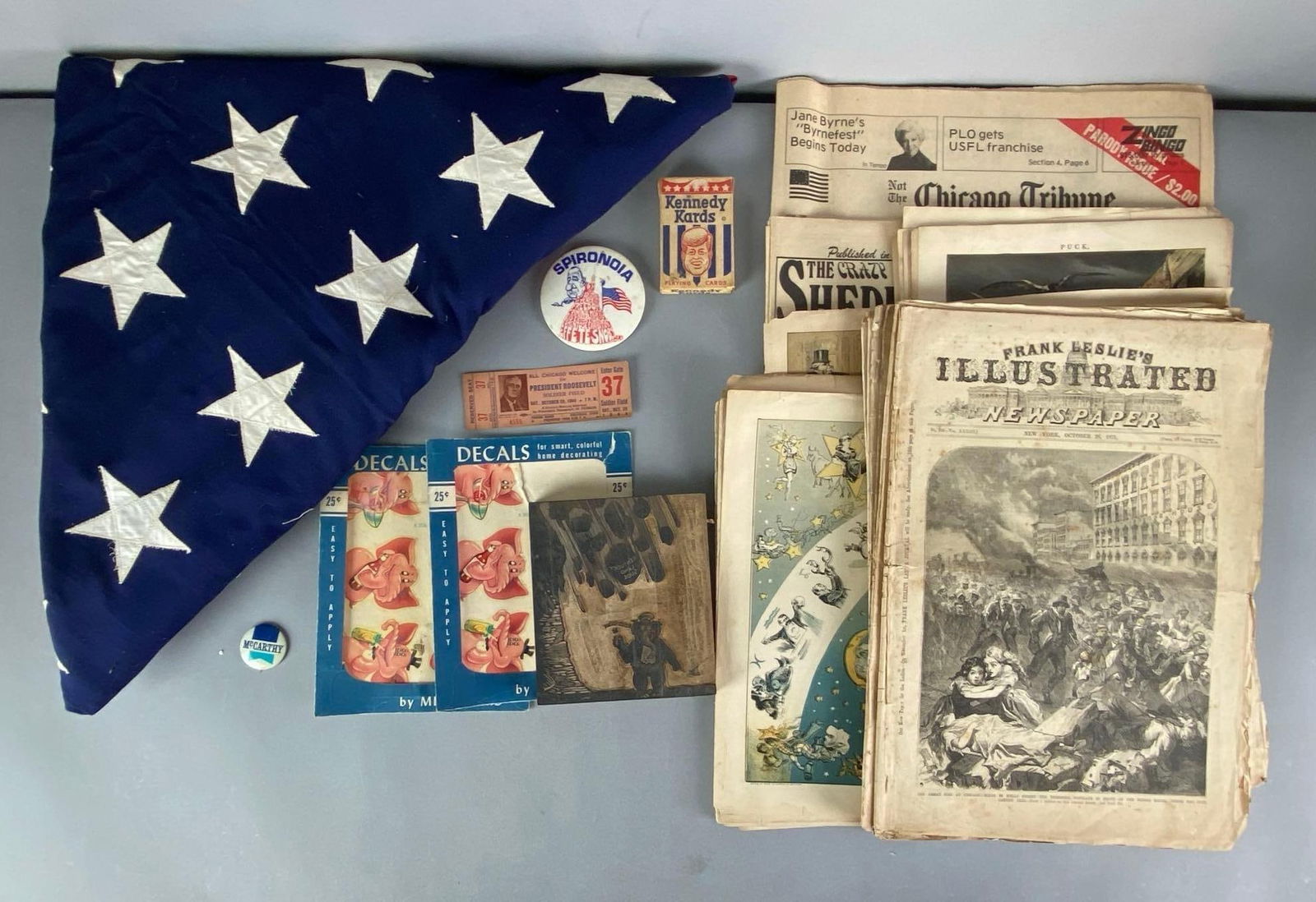 Group of Assorted Items: includes 48 Star United States Flag, Kennedy Cards, political woodblock stamp, newspapers, PUCK illustrations and more,