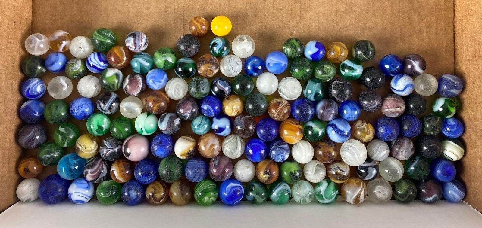 Group of 130+ Assorted Glass Marbles: largest measures .69”