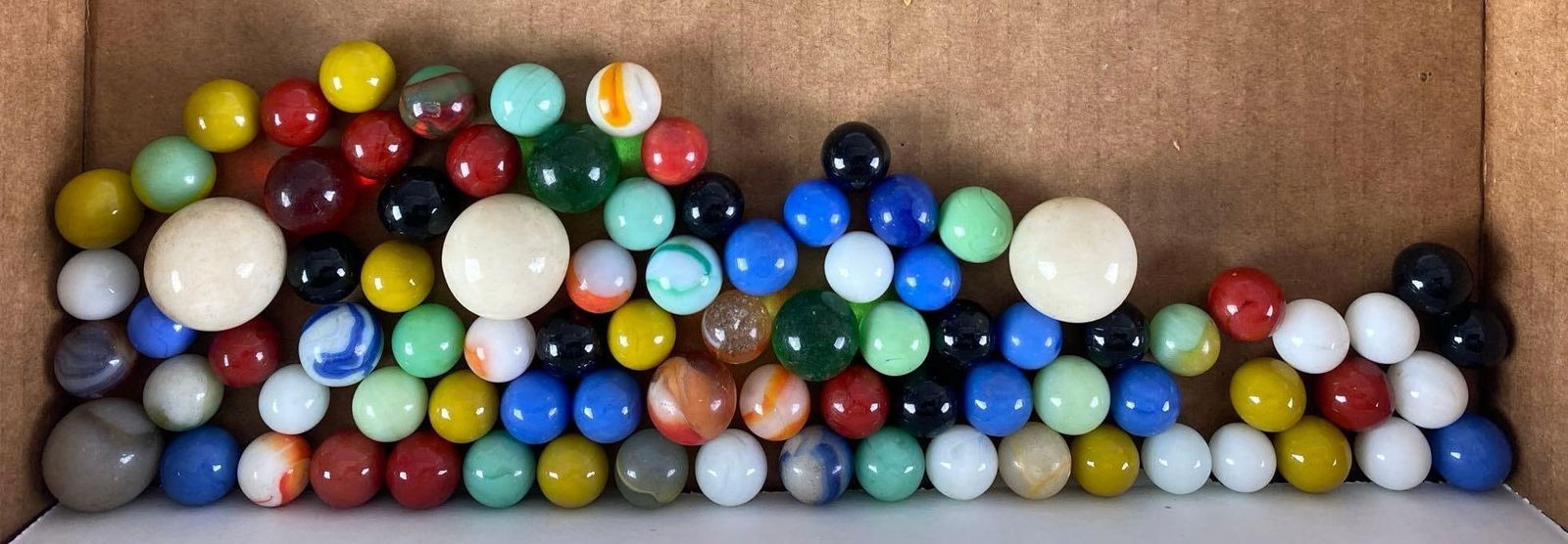 Group of 55+ Assorted Glass Marbles: Largest measures 1”