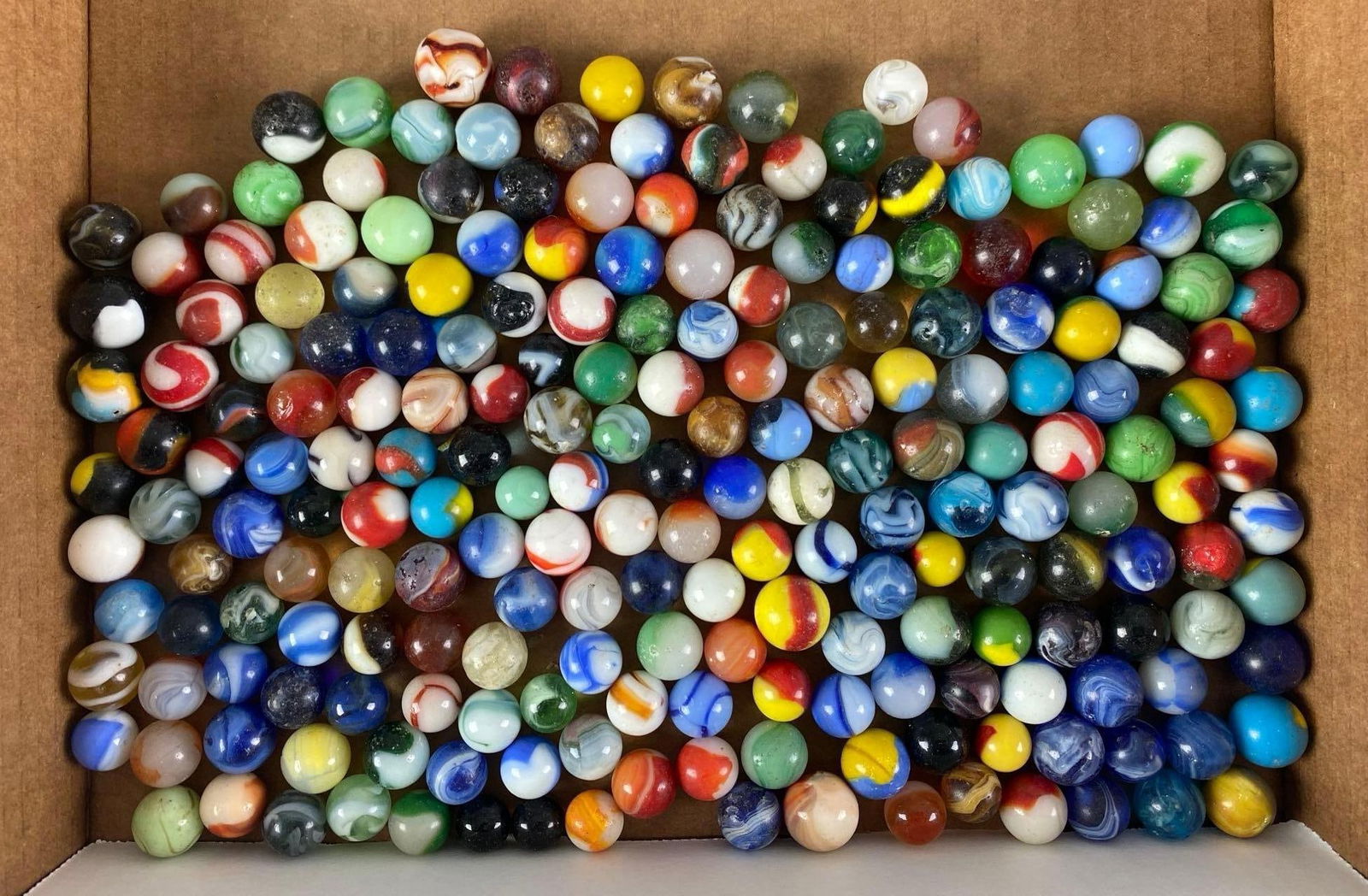 Group of 200+ Assorted Glass Marbles: Largest measures .78”