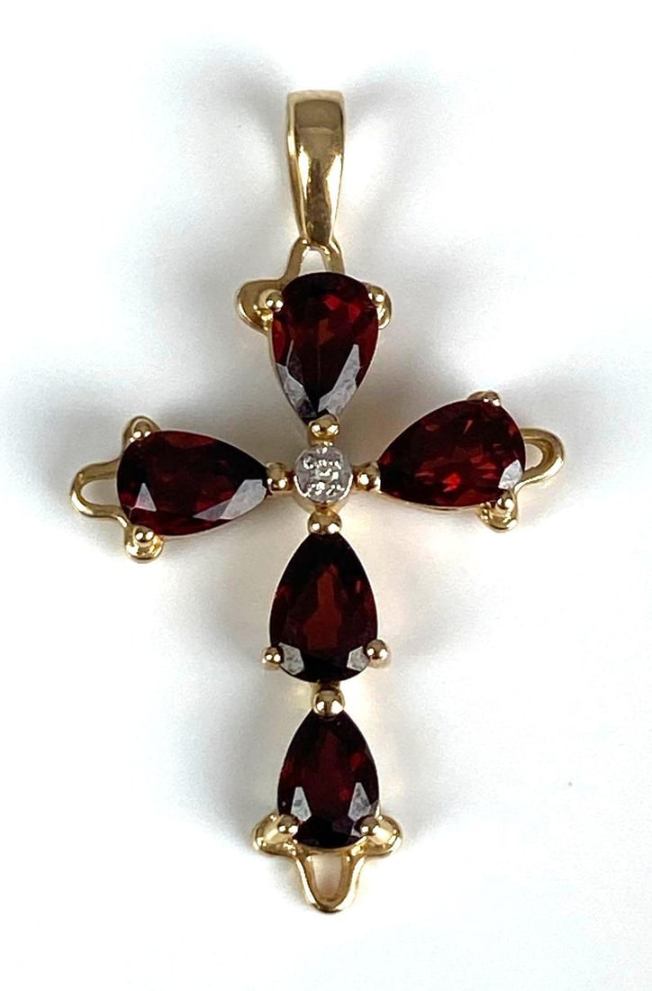 14K Yellow Gold Garnet Diamond Cross Necklace: Total weight of 1.6 grams, measures 1 1/4” H x 3/4” W