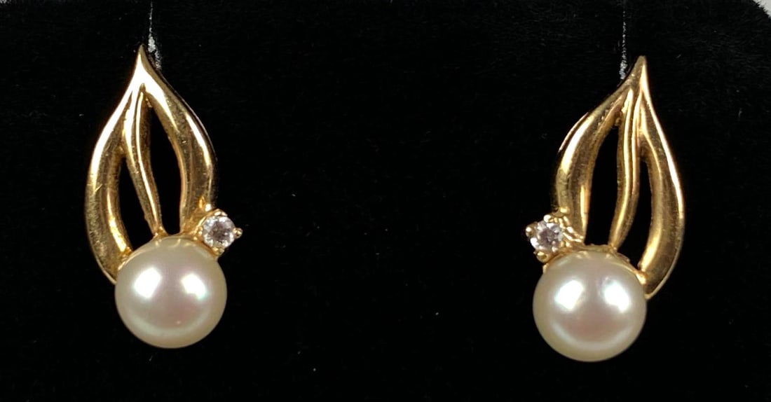 Pair of 14K Yellow Gold Pearl CZ Stud Earrings: Total weight of 3.7 grams, one earrings missing backing, each measures 3/4” H x 1/4” W