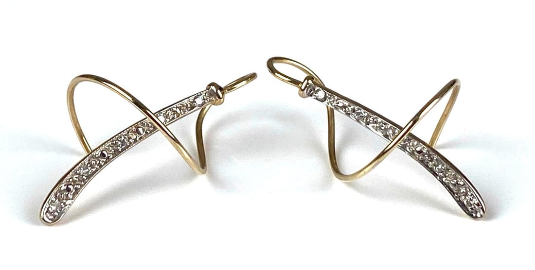 Pair of Signed HM 14K Yellow Gold Diamond Twist Earrings: Total weight of 2.1 grams, each measures 1 1/4” H x 1/2” W